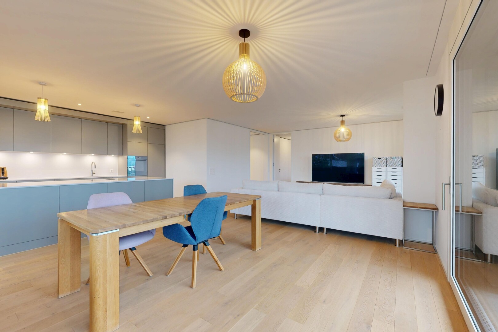 living / dining area with light wood finished floors