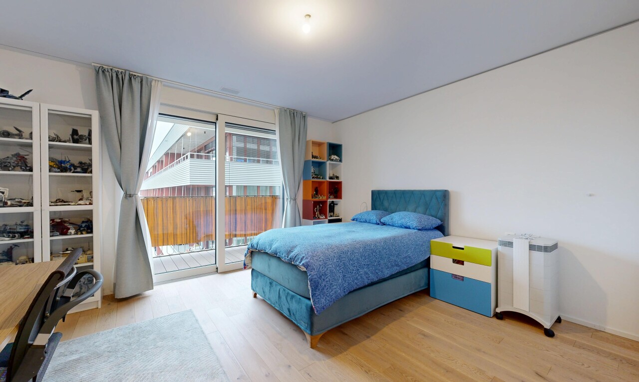 room / bedroom with access to outside and light wood finished floors