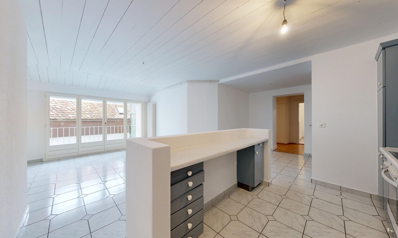 empty room featuring wood ceiling and light tile patterned floors