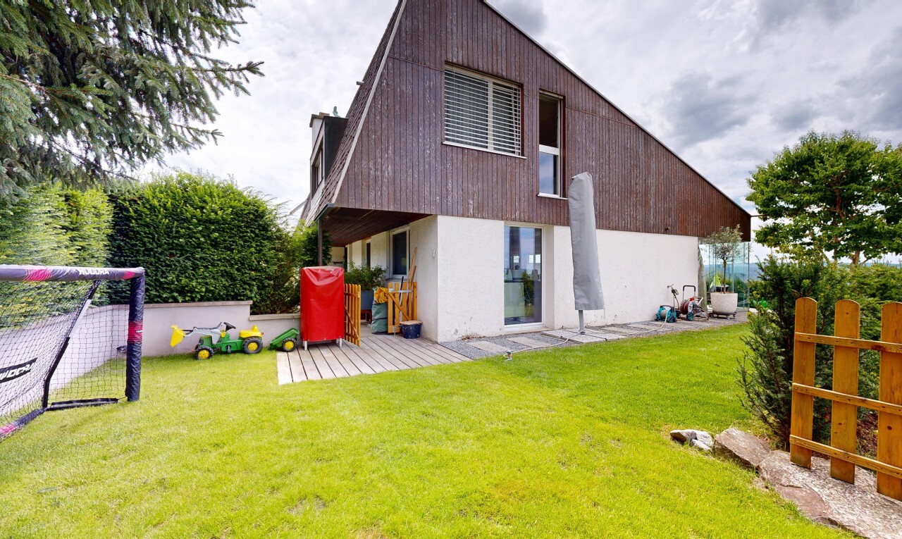 view of property featuring a yard