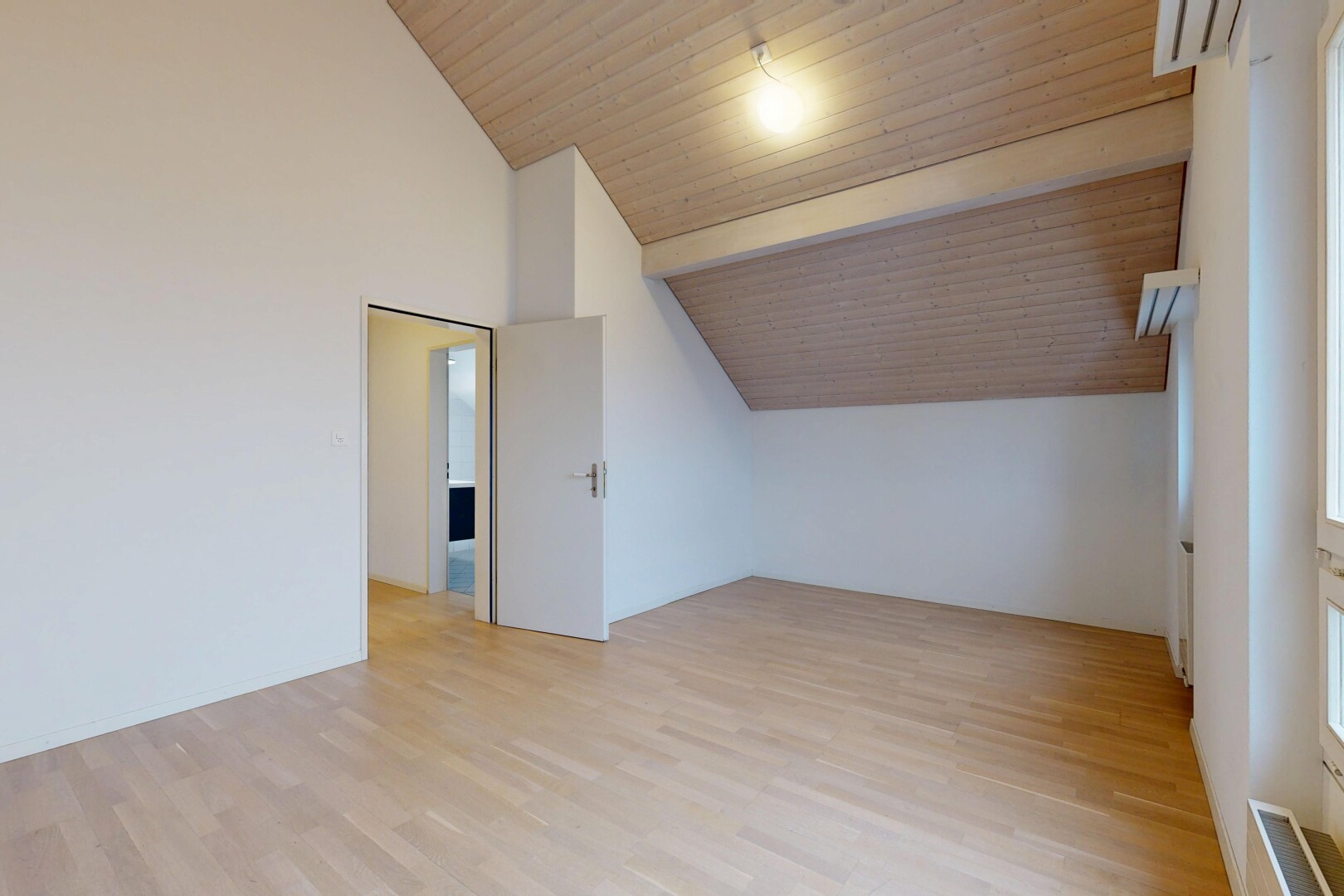 spare room featuring light wood-type flooring, a wooden ceiling with exposed beams, and high vaulted ceiling