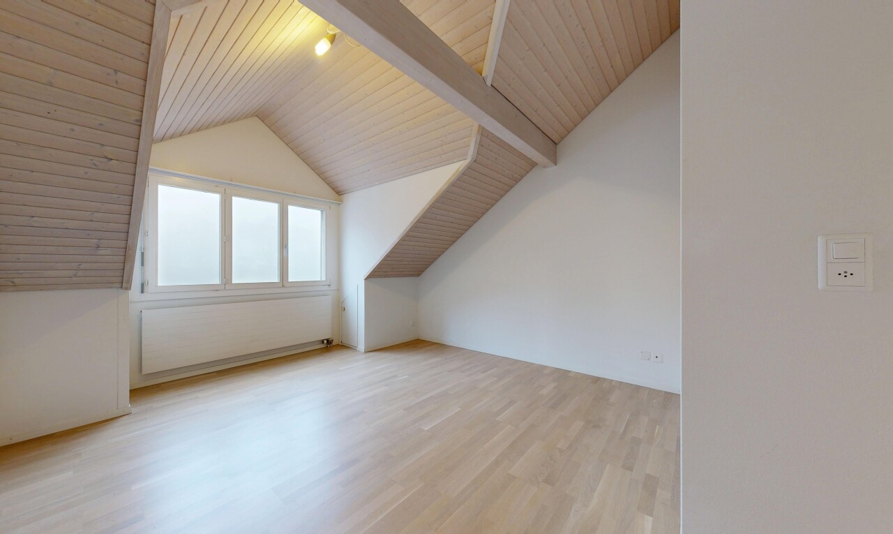 unfurnished room featuring light wood-style flooring and wooden ceiling