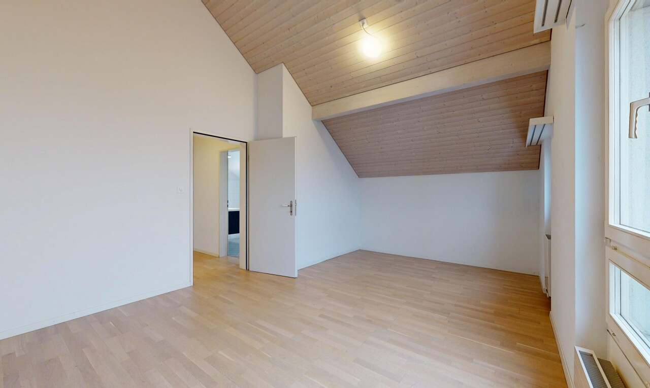 spare room featuring light wood-type flooring, a wooden ceiling with exposed beams, and high vaulted ceiling
