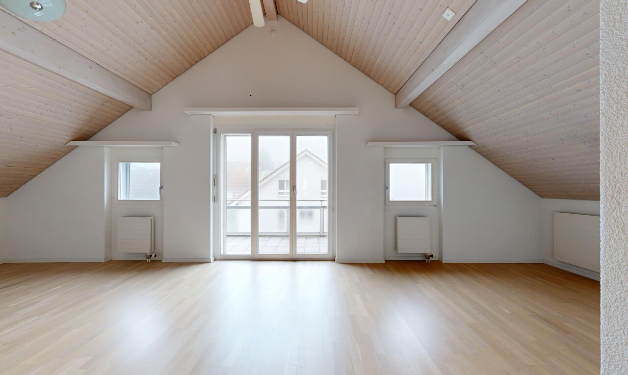 spare room featuring light wood-style floors, plenty of natural light, radiator heating unit, and wooden ceiling