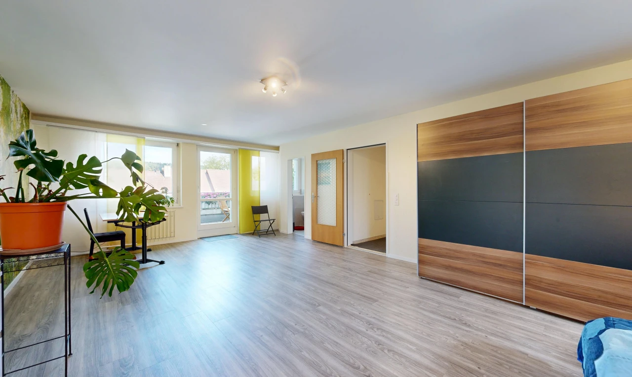 chambre avec drywall, cloison sèche, inside property, wood finish floor, et sol en finition bois