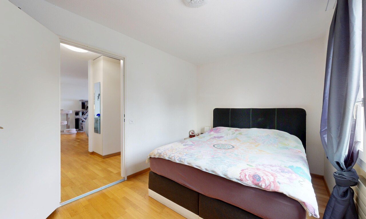 room / bedroom with light wood-style floors and baseboards