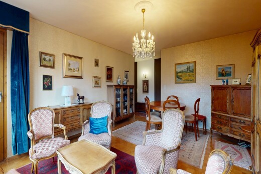 living / dining room with hanging lights