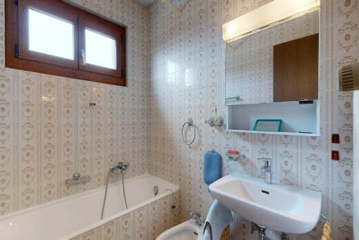 full bath featuring a bath and a bidet