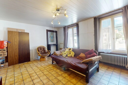 salon avec radiateur, inside property, natural light, lumière naturelle, et tile floor