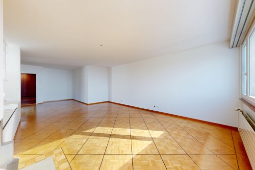 leerer raum mit inside property, kühler, drywall, gipskartonwand, und light floor