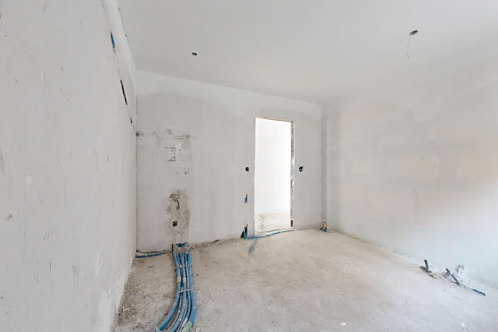 pièce vide avec inside property, drywall, et cloison sèche