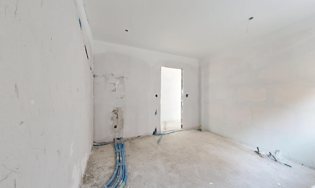 pièce vide avec inside property, drywall, et cloison sèche