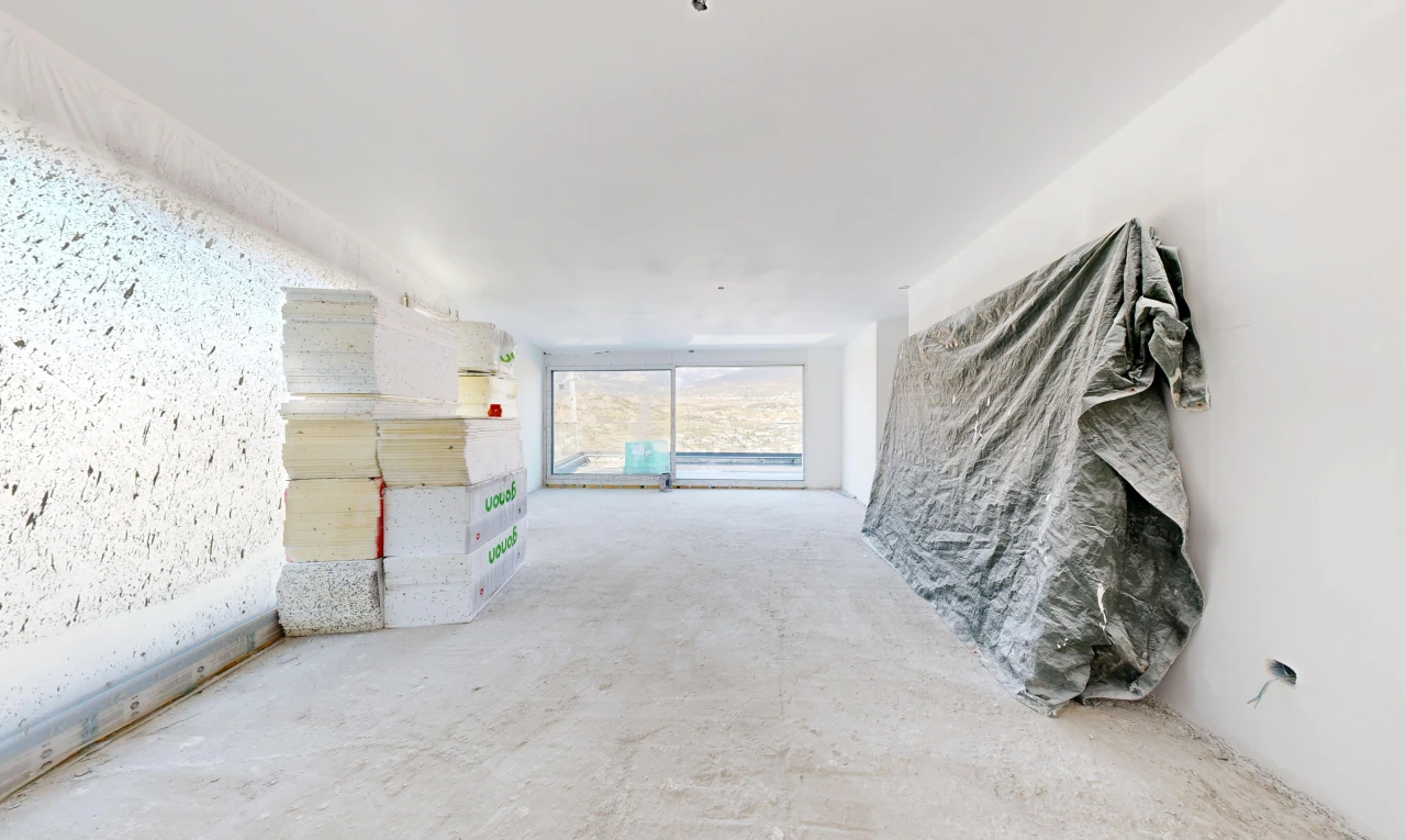 pièce vide avec inside property, concrete floor, et sol en béton