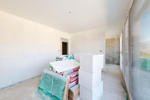 chambre avec sol en béton, concrete floor, cloison sèche, et drywall