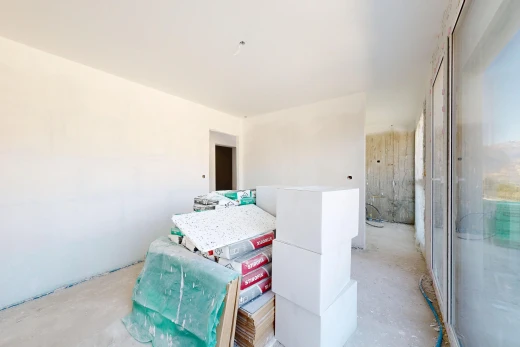chambre avec sol en béton, concrete floor, cloison sèche, et drywall