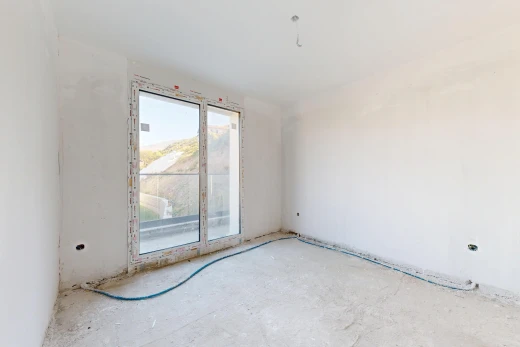 pièce vide avec unfinished floor, inside property, drywall, et cloison sèche
