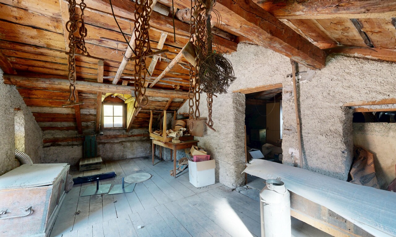 spare room with hardwood / wood-style floors, lofted ceiling, and log walls