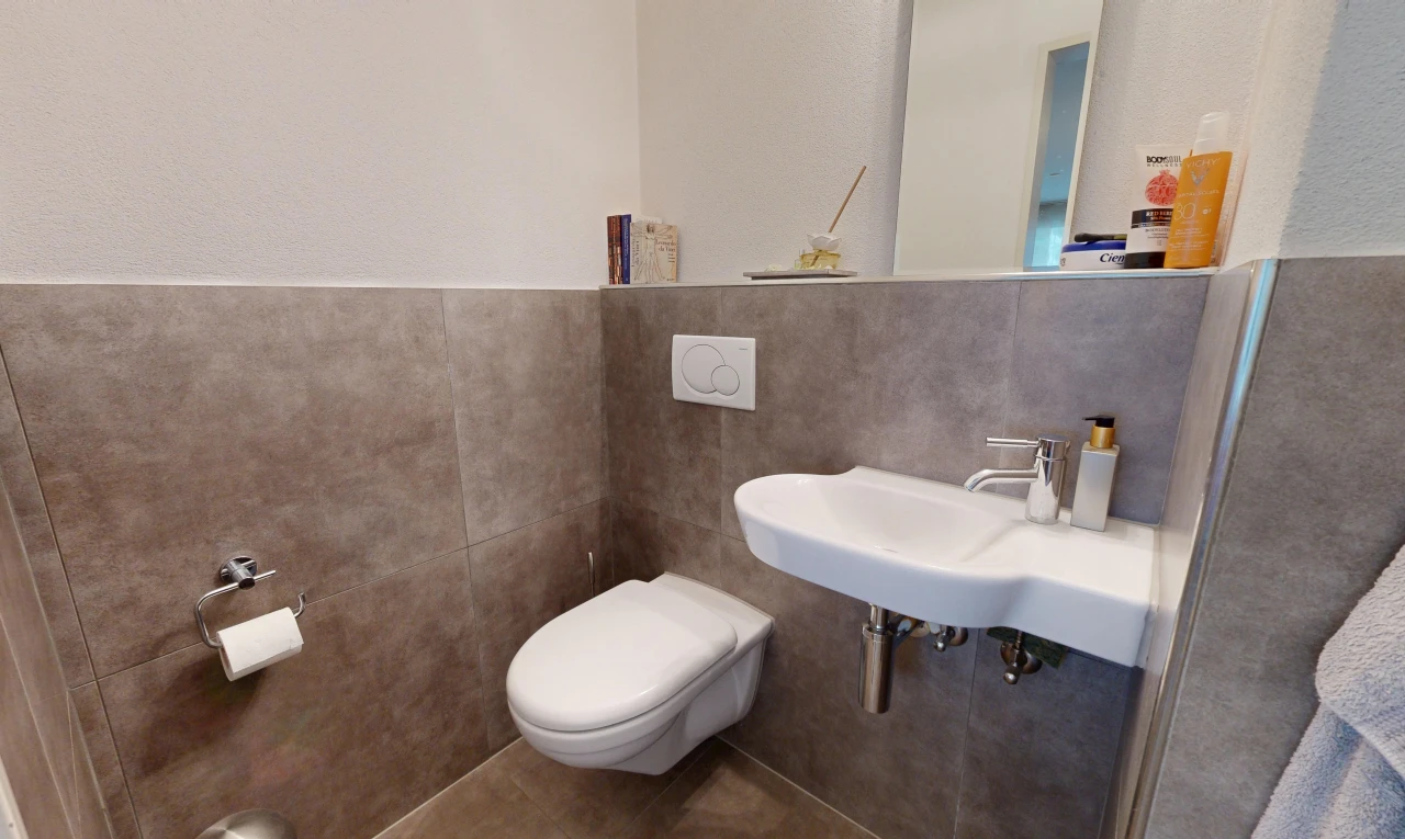 half bathroom with a sink