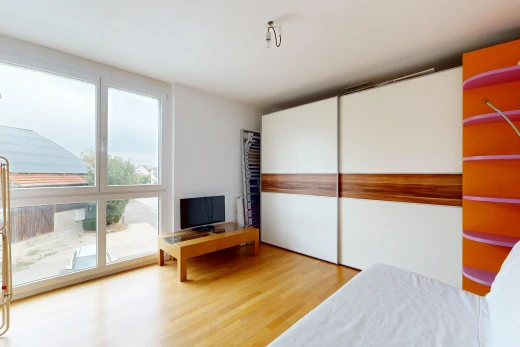 room / bedroom with light wood-type flooring