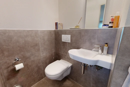 half bathroom with a sink