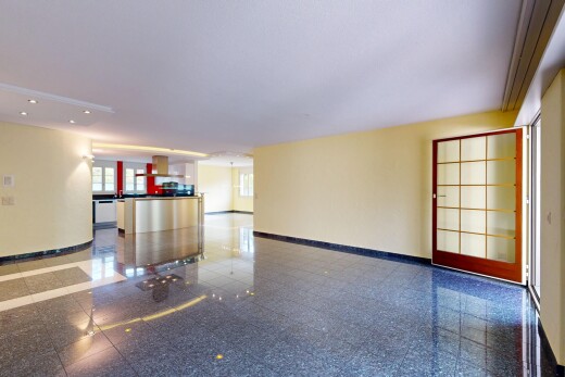 réception / lobby avec inside community, baseboards wall, natural light, drywall, et granite finish floor
