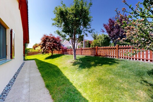garden with a fenced backyard