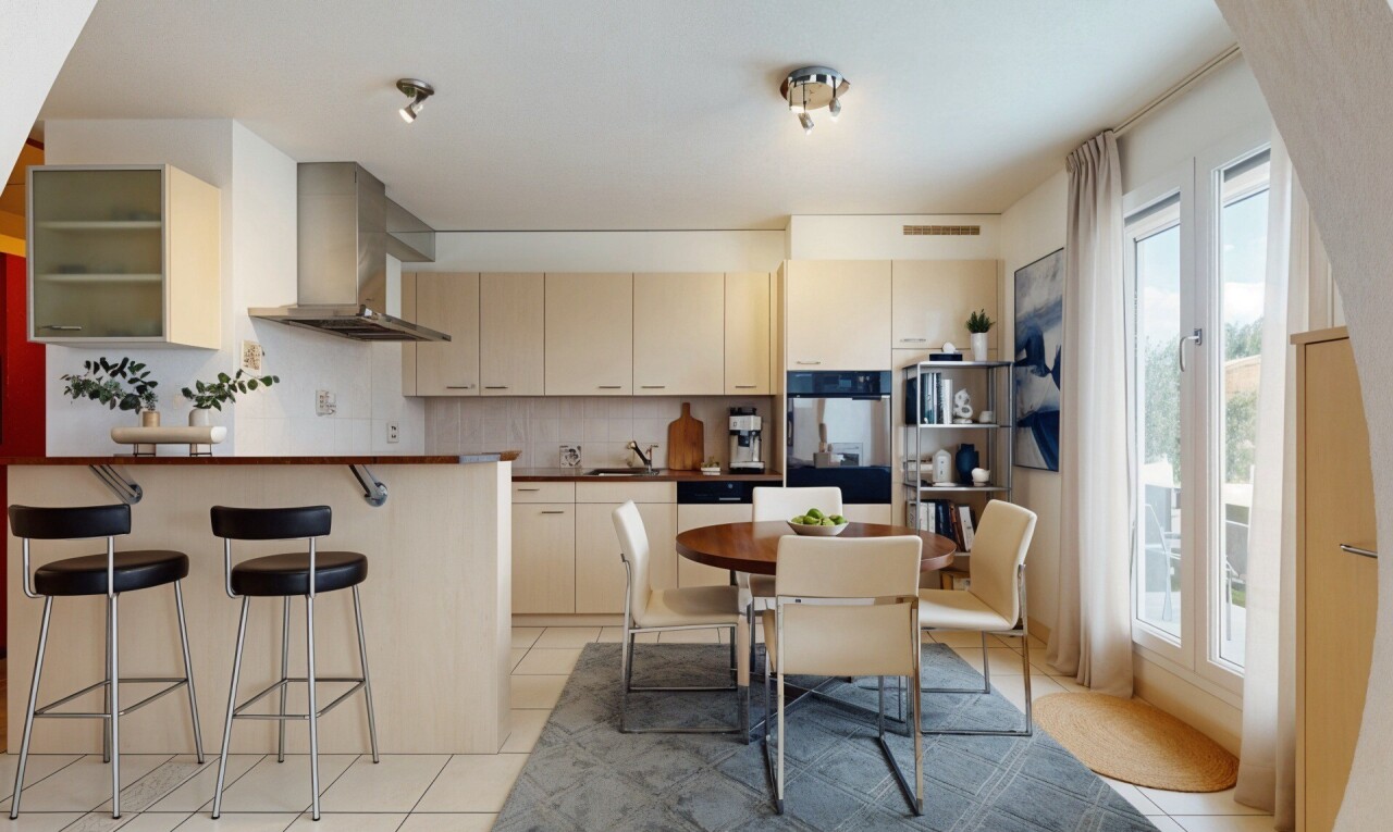cuisine avec backsplash, dosseret, virtually staged, hotte, et armoires crème
