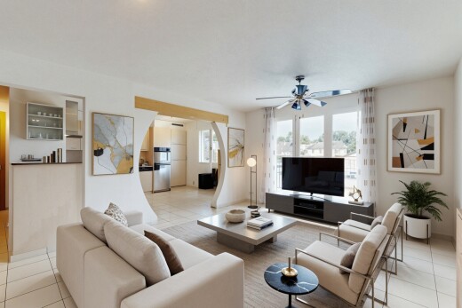 wohnzimmer mit fliesenboden, tile floor, virtually staged, fernseher, und natürliches licht