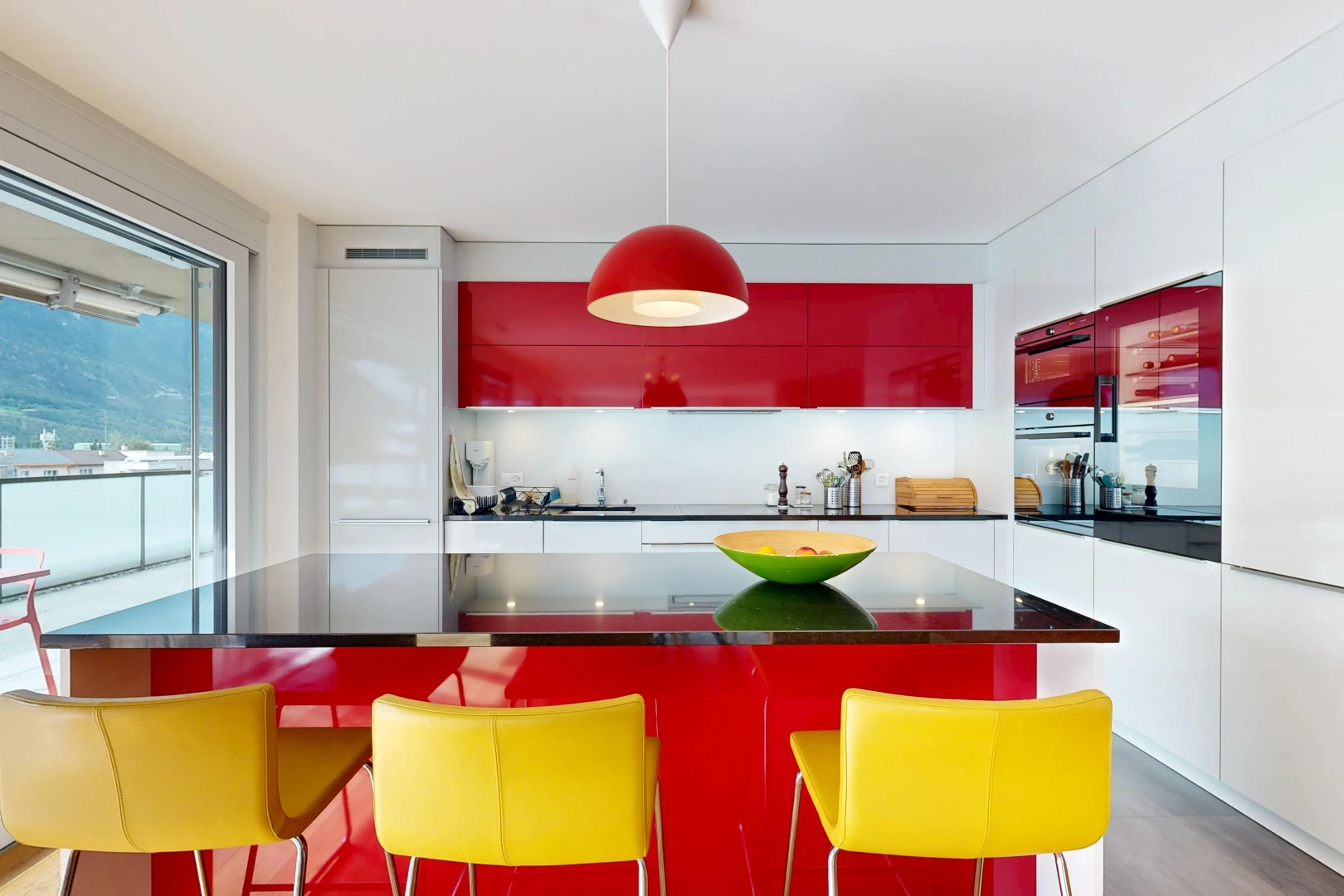 cuisine avec two tone kitchen, éclairage suspendu, dark countertops, plans de travail, et inside property