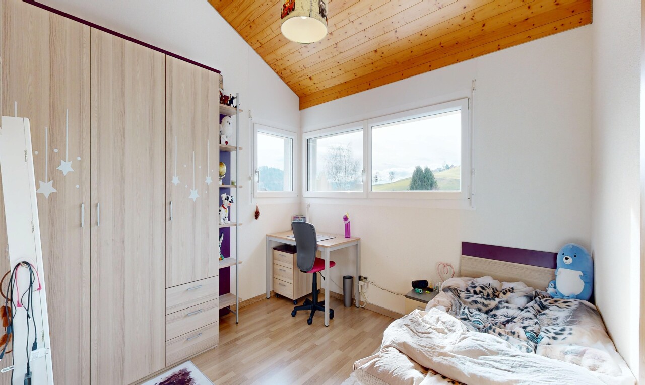 room / bedroom featuring a vaulted wood ceiling, light wood-type flooring, and a desk