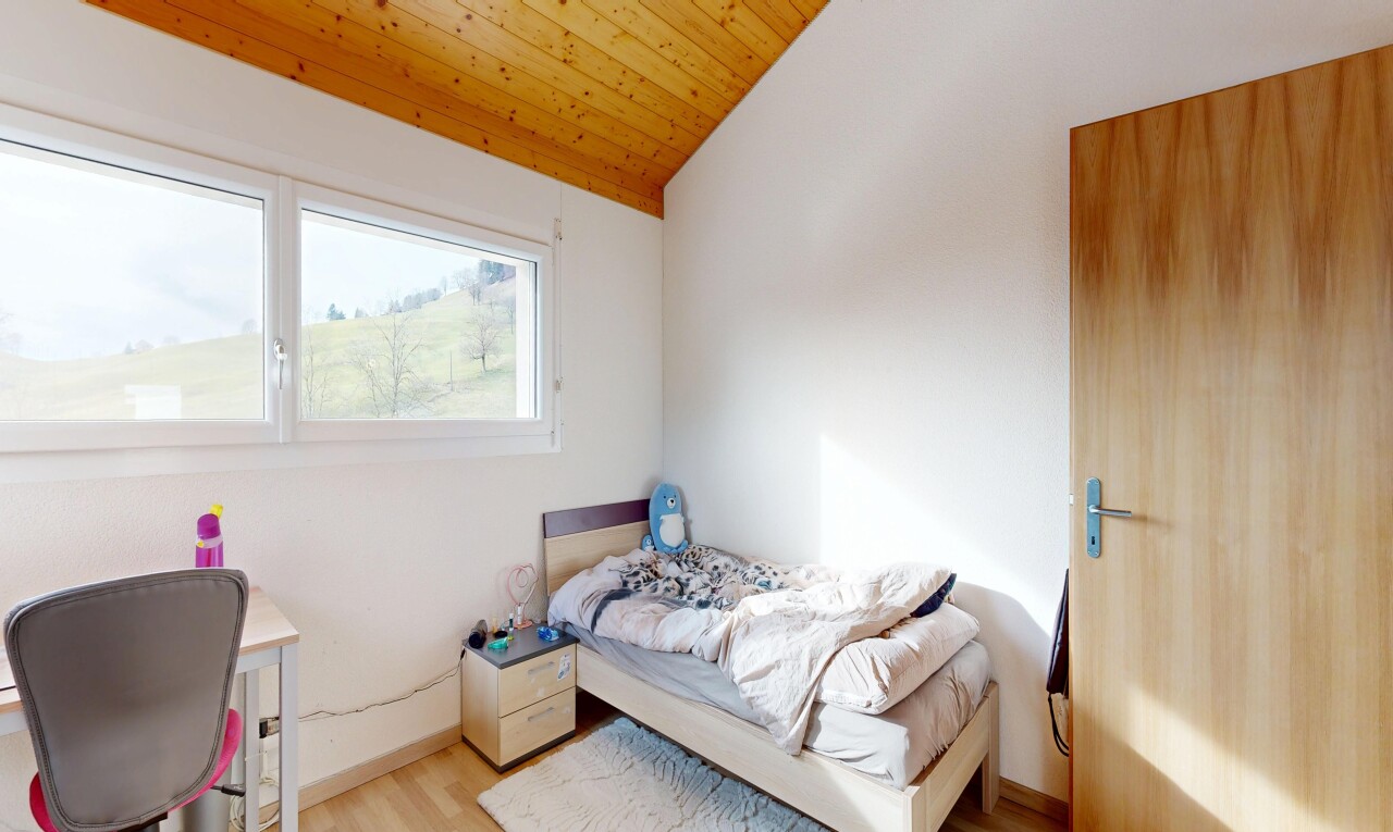 room / bedroom featuring wood finished floors and a vaulted wood ceiling