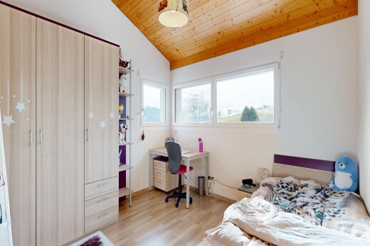 room / bedroom featuring a vaulted wood ceiling, light wood-type flooring, and a desk