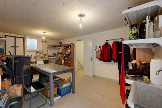 dining room with concrete flooring