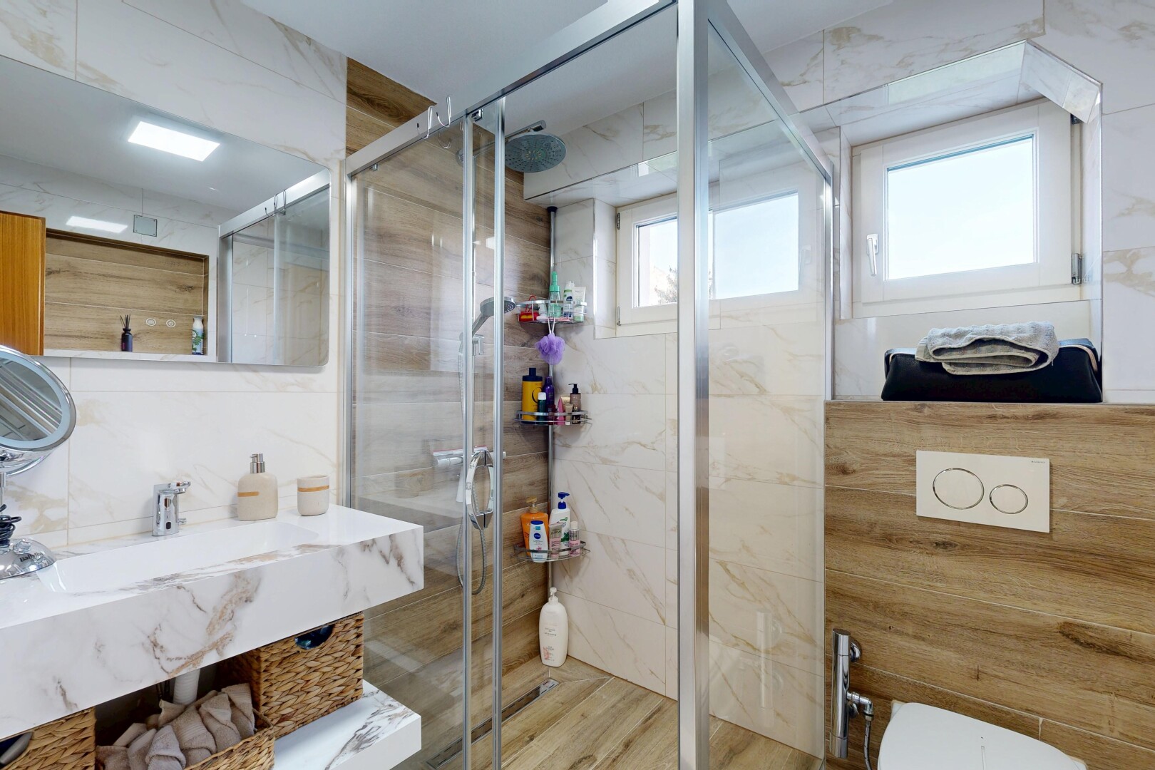 bathroom with vanity and a stall shower