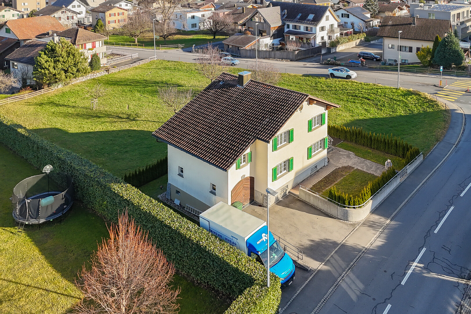 view of property with a residential view and stucco siding