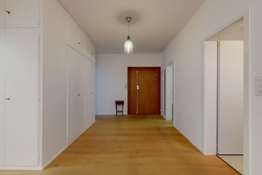 halle / korridor mit holzfußboden, wood finish floor, gipskartonwand, drywall, und inside property