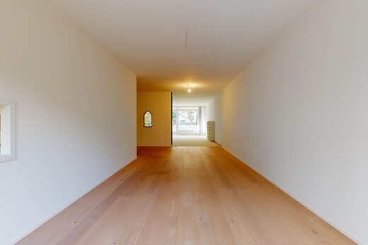 halle / korridor mit gipskartonwand, drywall, inside property, holzfußboden, und wood finish floor