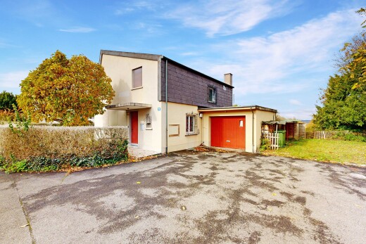 façade avec clôture, day time, property visible, bardage en stuc, et cheminée