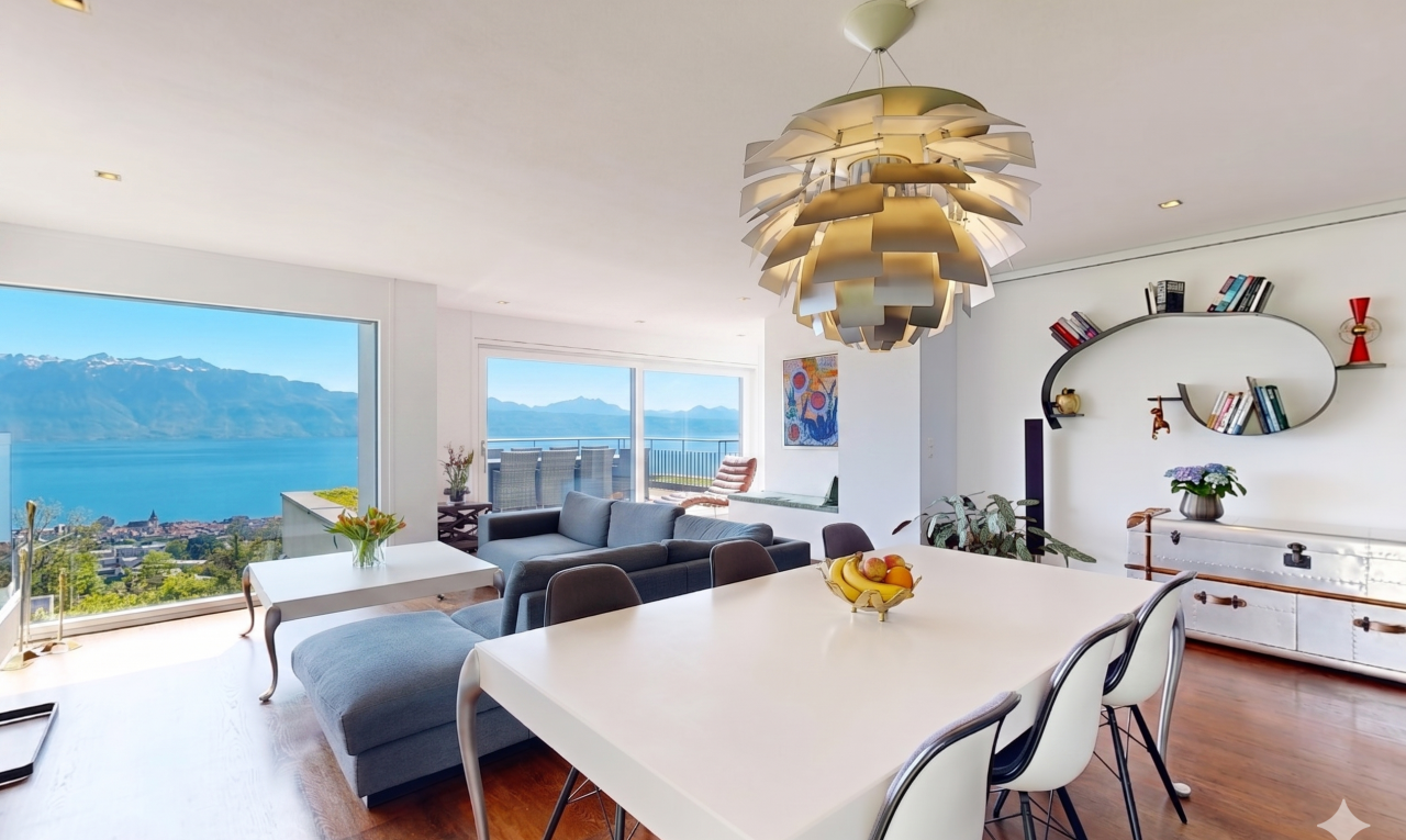 salon / salle à manger avec vue sur la montagne, mountain view, drywall, cloison sèche, et inside property