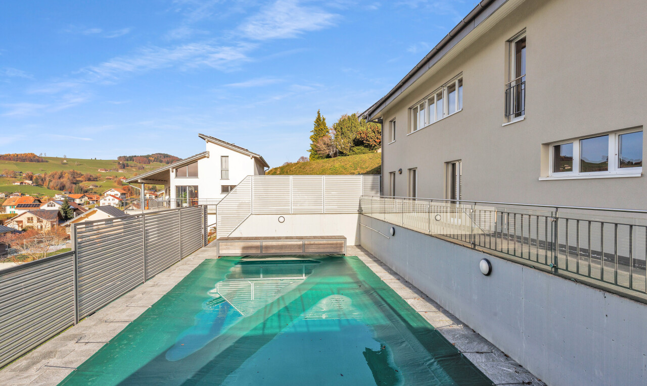 view of swimming pool featuring a fenced backyard