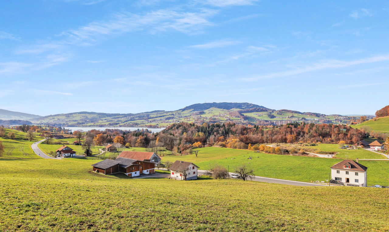 view of mountain background featuring rural landscape
