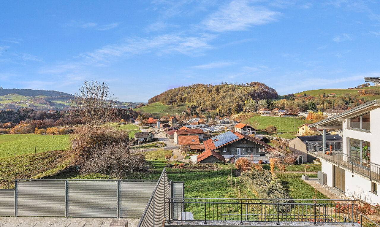 view of mountain backdrop with nearby suburban area