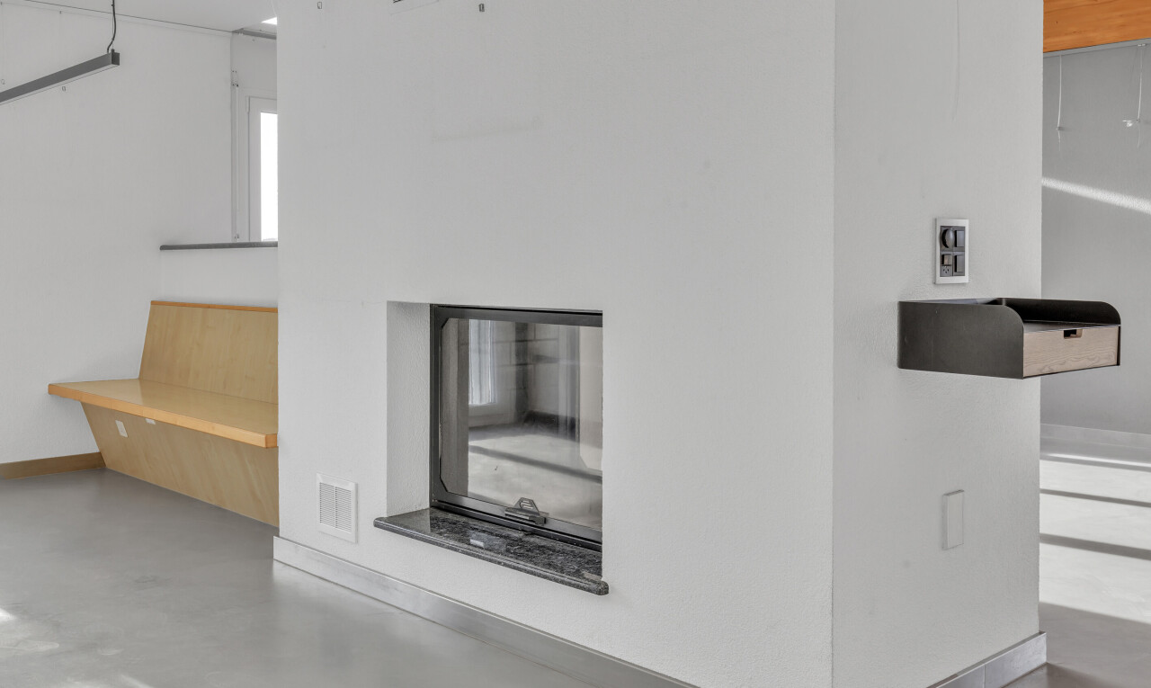 detailed view of concrete flooring and baseboards