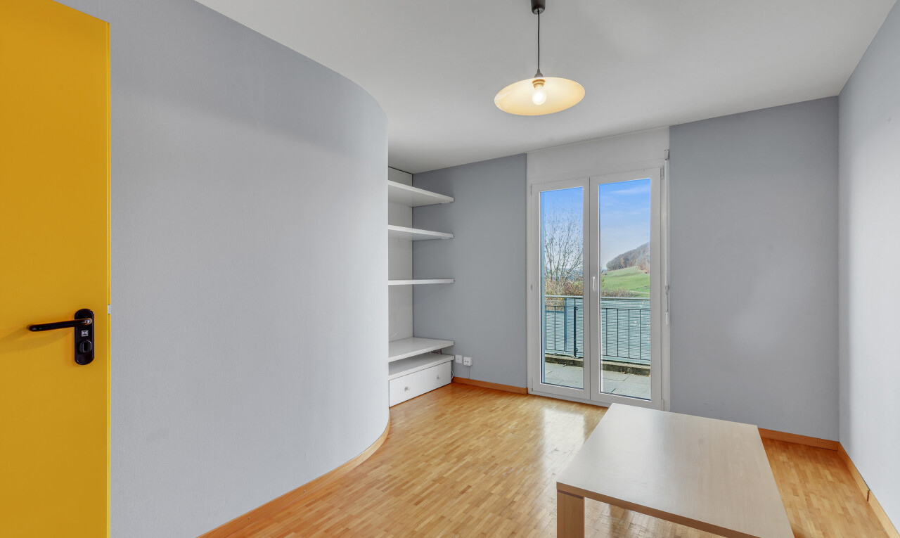 unfurnished room featuring light wood-style floors