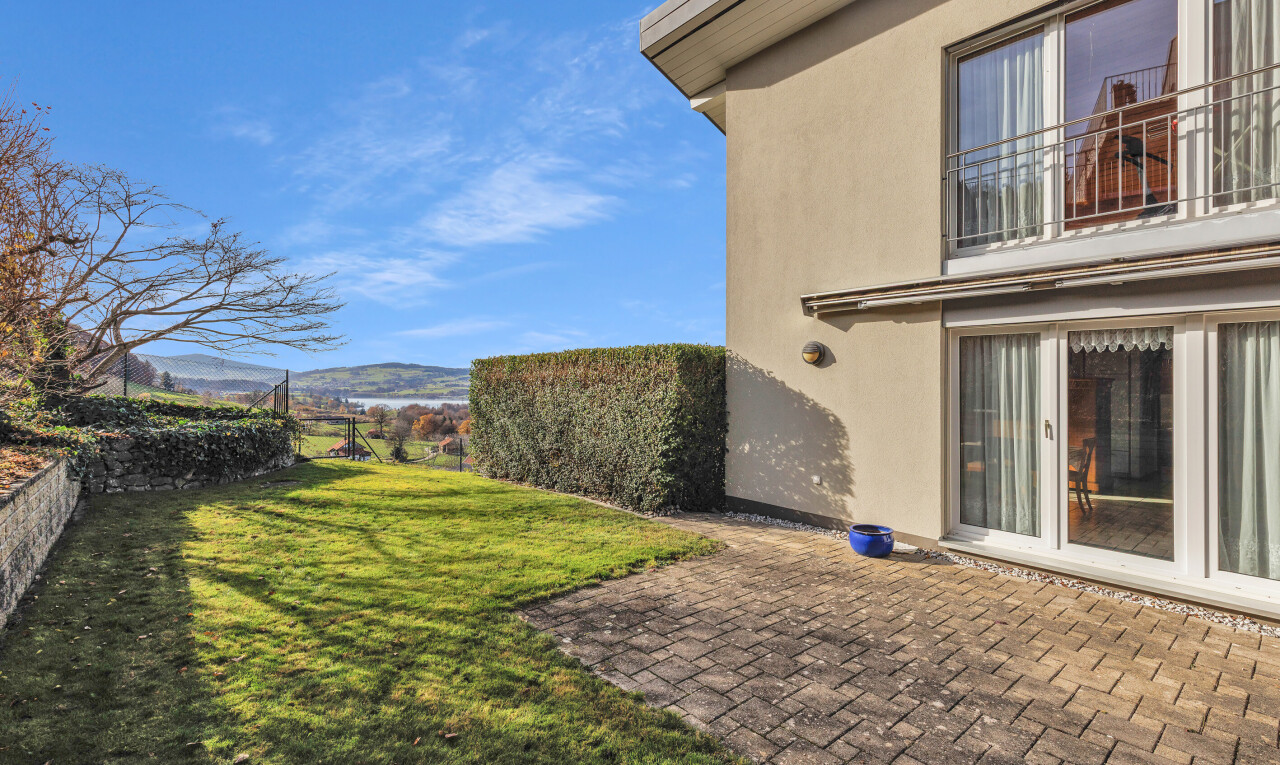 patio / terrace with a mountain view, a balcony, and a patio