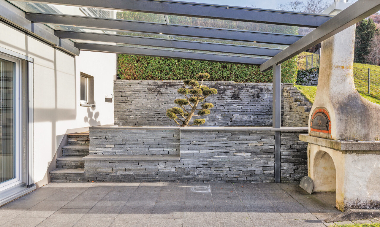 patio / terrace with a patio and a pergola