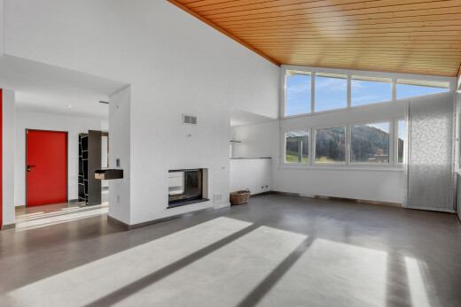 wohnzimmer mit finished concrete floor, concrete floor, betonboden, day time, und kamin