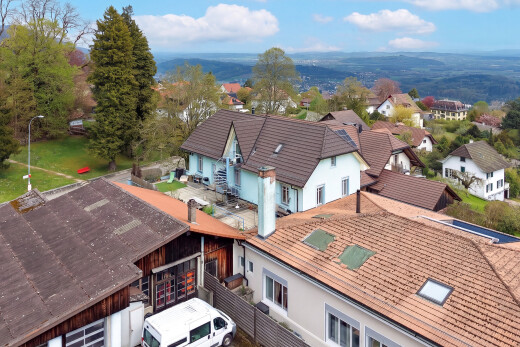 außenansicht mit wohngebietblick, residential view, day time, stuckverkleidung, und drone view