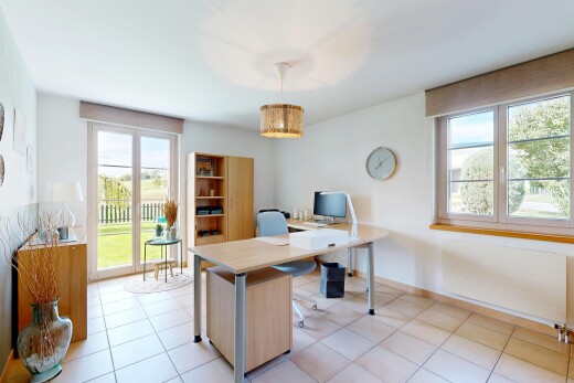 home office featuring radiator heating unit, light tile patterned flooring, and a chandelier