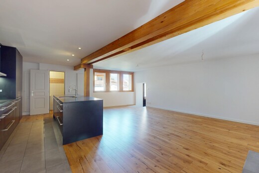 küche mit holzfußboden, gipskartonwand, natürliches licht, und öffnet sich zum wohnraum